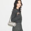 Bolso cilíndrico T Monogram Utility Bolso cilíndrico T Monogram Utility