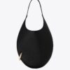 Bolso con perforaciones y granulado Bolso con perforaciones y granulado