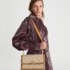 Bolso de hombro con T Monogram