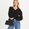 Bolso pequeño East-West con T Monogram en relieve