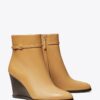 Botas con cuña y doble hebilla Double T Botas con cuña y doble hebilla Double T