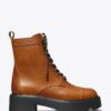 Botas con suela gruesa y T Monogram Botas con suela gruesa y T Monogram
