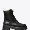 Botas con suela gruesa y T Monogram Botas con suela gruesa y T Monogram