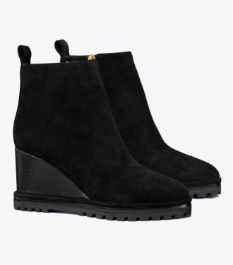 Botas de cuña con suela gruesa y logotipo en ante
