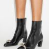 Botines con tacón y talón perforado Botines con tacón y talón perforado