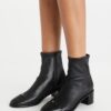 Botines de tacón bajo con puntera Botines de tacón bajo con puntera
