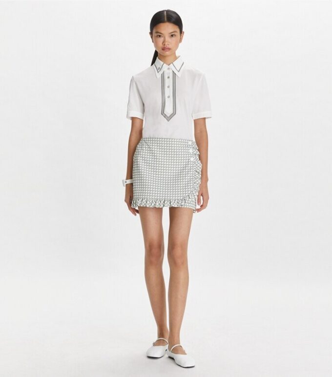 Falda de golf de sarga con volantes estampada Falda de golf de sarga con volantes estampada