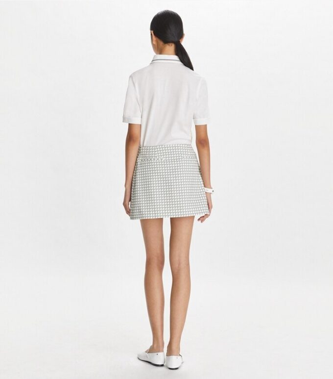 Falda de golf de sarga con volantes estampada Falda de golf de sarga con volantes estampada
