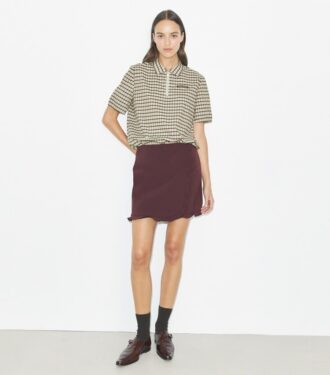Falda de golf elástica con volantes