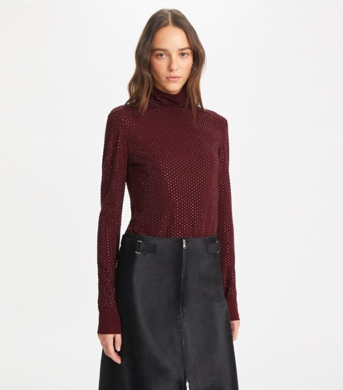 Jersey de viscosa con cuello alto y adornos Jersey de viscosa con cuello alto y adornos