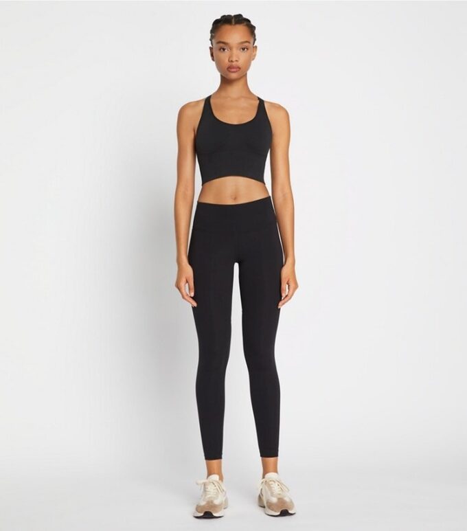 Leggings con bolsillos laterales y compresión moldeadora Leggings con bolsillos laterales y compresión moldeadora