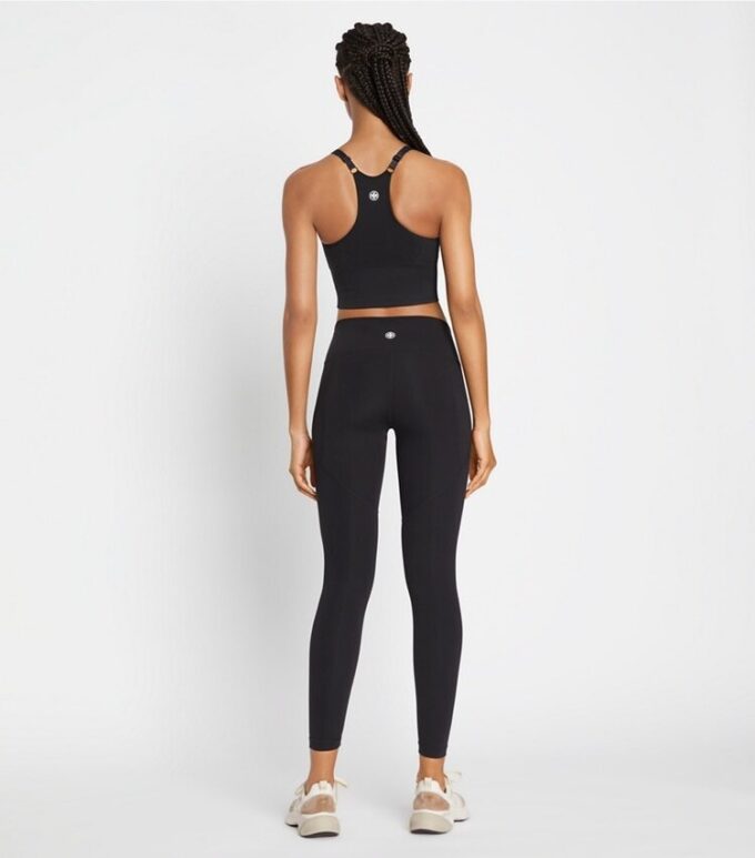 Leggings con bolsillos laterales y compresión moldeadora Leggings con bolsillos laterales y compresión moldeadora