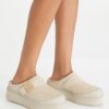 Mules con plataforma de piel de oveja Mellow Mules con plataforma de piel de oveja Mellow
