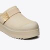 Mules con plataforma de piel de oveja Mellow Mules con plataforma de piel de oveja Mellow