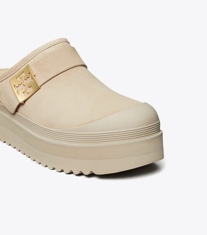 Mules con plataforma de piel de oveja Mellow Mules con plataforma de piel de oveja Mellow