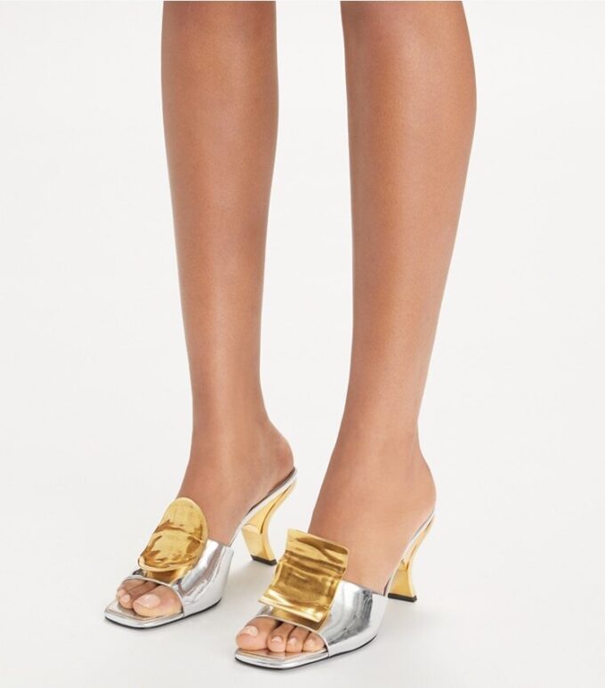 Mules con tacones desiguales Patos Mules con tacones desiguales Patos