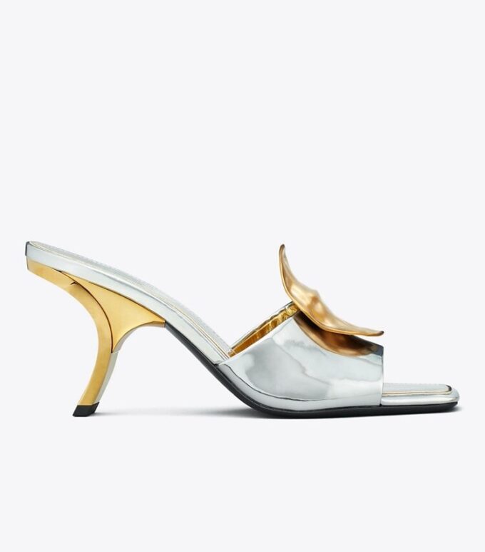 Mules con tacones desiguales Patos Mules con tacones desiguales Patos