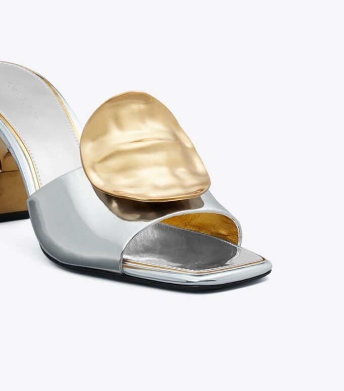 Mules con tacones desiguales Patos Mules con tacones desiguales Patos