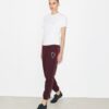Pantalones de chándal de felpa francesa con corazón bordado