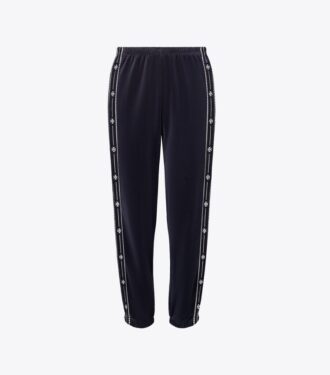 Pantalones de chándal de terciopelo con logotipo T