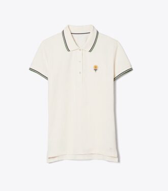 Polo de piqué con flores de alto rendimiento Polo de piqué con flores de alto rendimiento