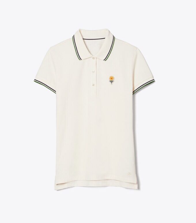 Polo de piqué con flores de alto rendimiento Polo de piqué con flores de alto rendimiento