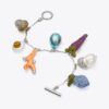 Pulsera con dijes de verduras Curiosity Pulsera con dijes de verduras Curiosity