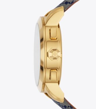 Reloj Tory con T Monogram, azul marino/acero inoxidable dorado, 37 x 37 mm