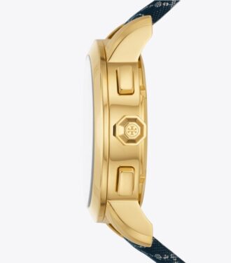 Reloj Tory con T Monogram, cuero/acero inoxidable dorado