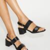 Sandalias con tacón y cierre giratorio Sandalias con tacón y cierre giratorio