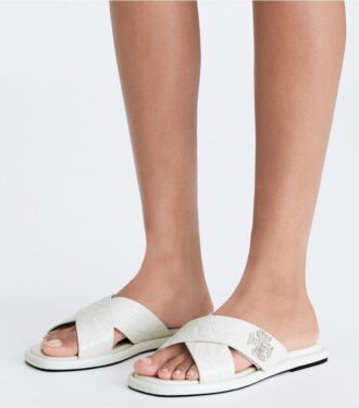 Sandalias con tiras cruzadas y cierre giratorio