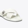 Sandalias con tiras cruzadas y cierre giratorio