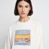 Sudadera de felpa francesa gruesa y holgada con parche con logotipo