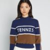 Suéter corto de tenis de nylon técnico Suéter corto de tenis de nylon técnico
