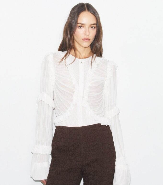 Top de jersey transparente con volantes Top de jersey transparente con volantes