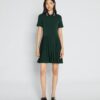 Vestido de golf con pliegues y cremallera delantera