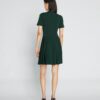 Vestido de golf con pliegues y cremallera delantera
