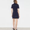 Vestido polo elástico con puntadas decorativas Vestido polo elástico con puntadas decorativas
