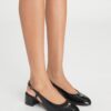 Zapatos destalonados con puntera Zapatos destalonados con puntera